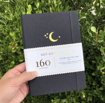 gold foil moon dot grid bullet journal